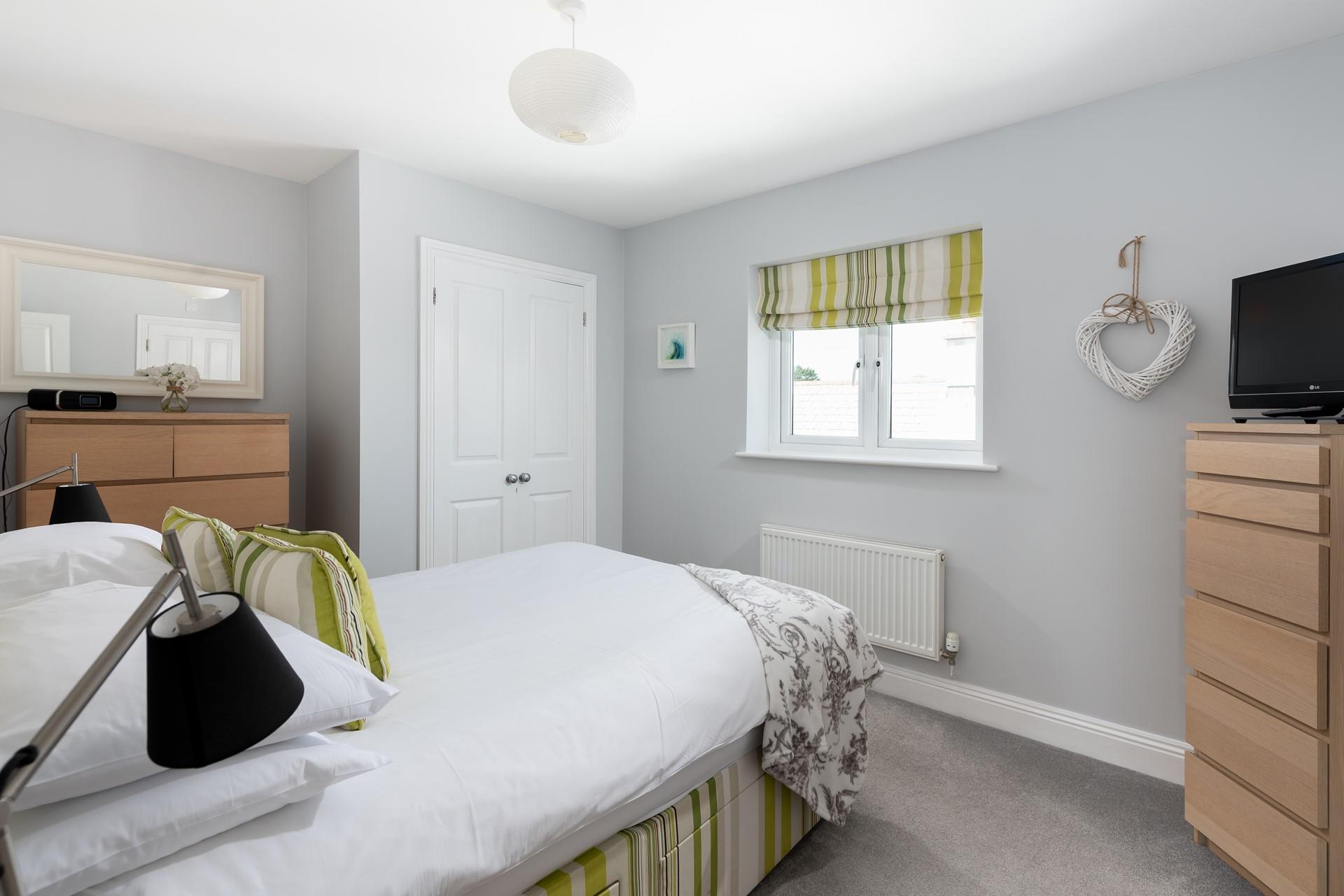 Sink into the soft sheets in the spacious double bed and drift off for a dreamy night's sleep.