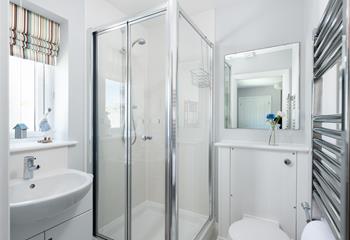 The en suite has a shower to wash off your sandy toes after a day on the beach.