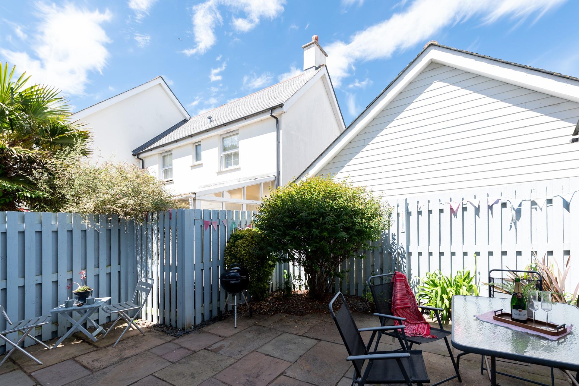 The courtyard area is enclosed and perfect for evening barbecues.