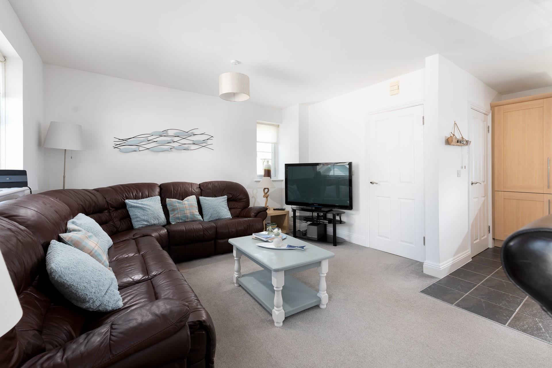 Sink into the leather sofa and have a family movie night.