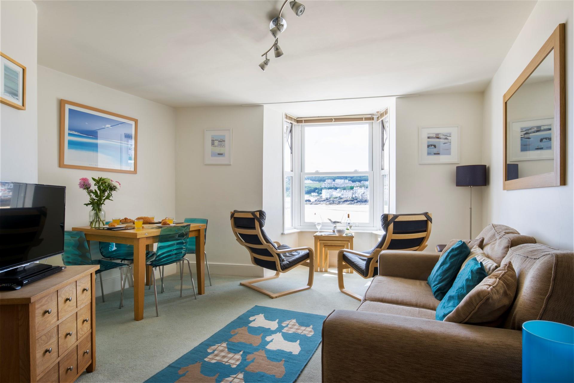 Sink into the sofa in the evening with a glass of wine and watch your favourite film.