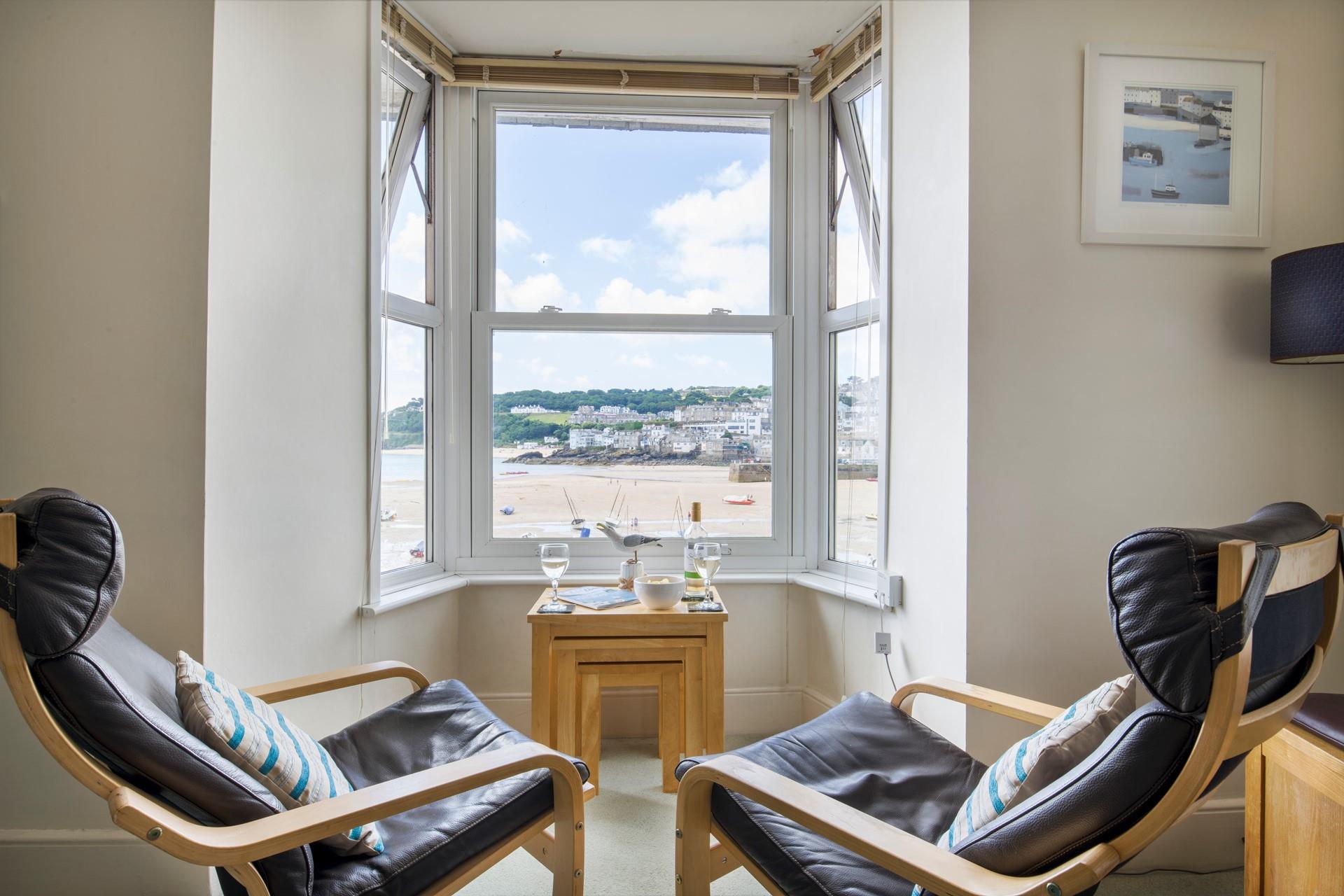 Relax with a glass of your favourite tipple, while overlooking the blue waters of St Ives harbour.