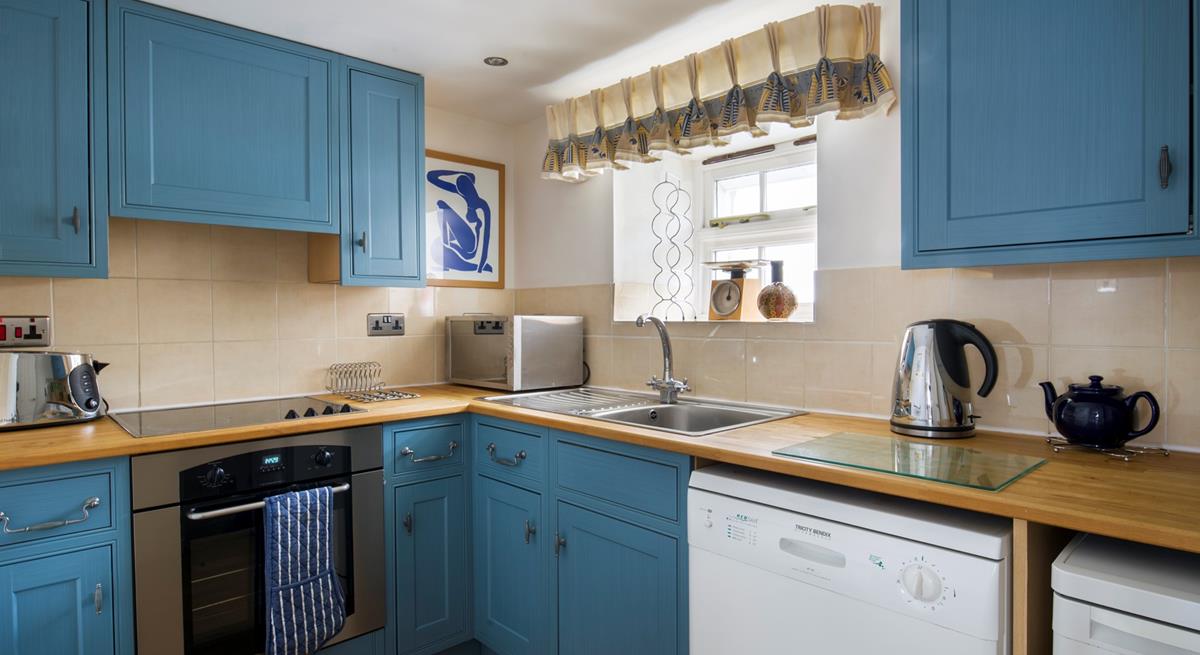 Cook up family meals in the kitchen to enjoy together in the evenings.