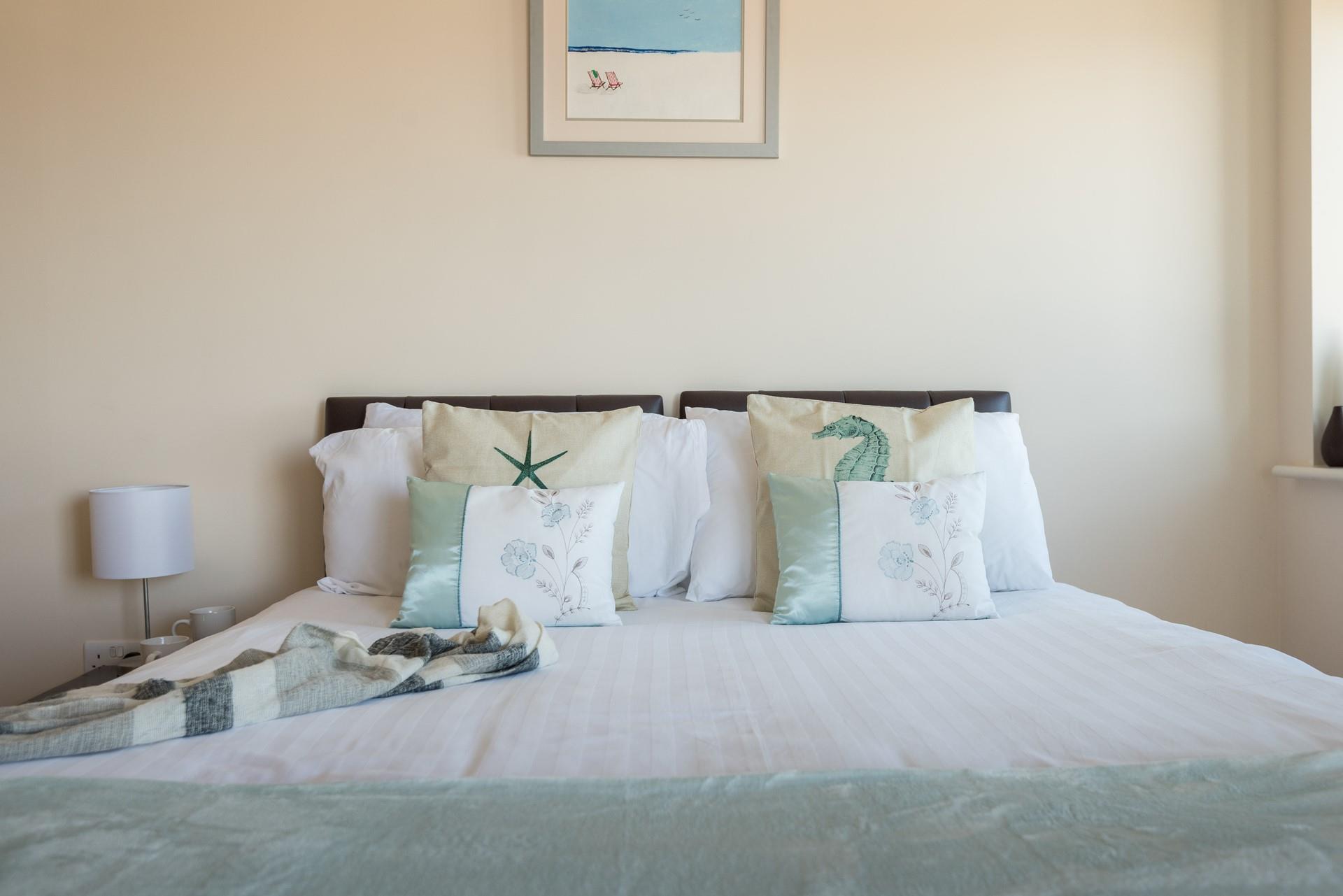 The gorgeous interiors are inspired by the surrounding coastal scenery. 