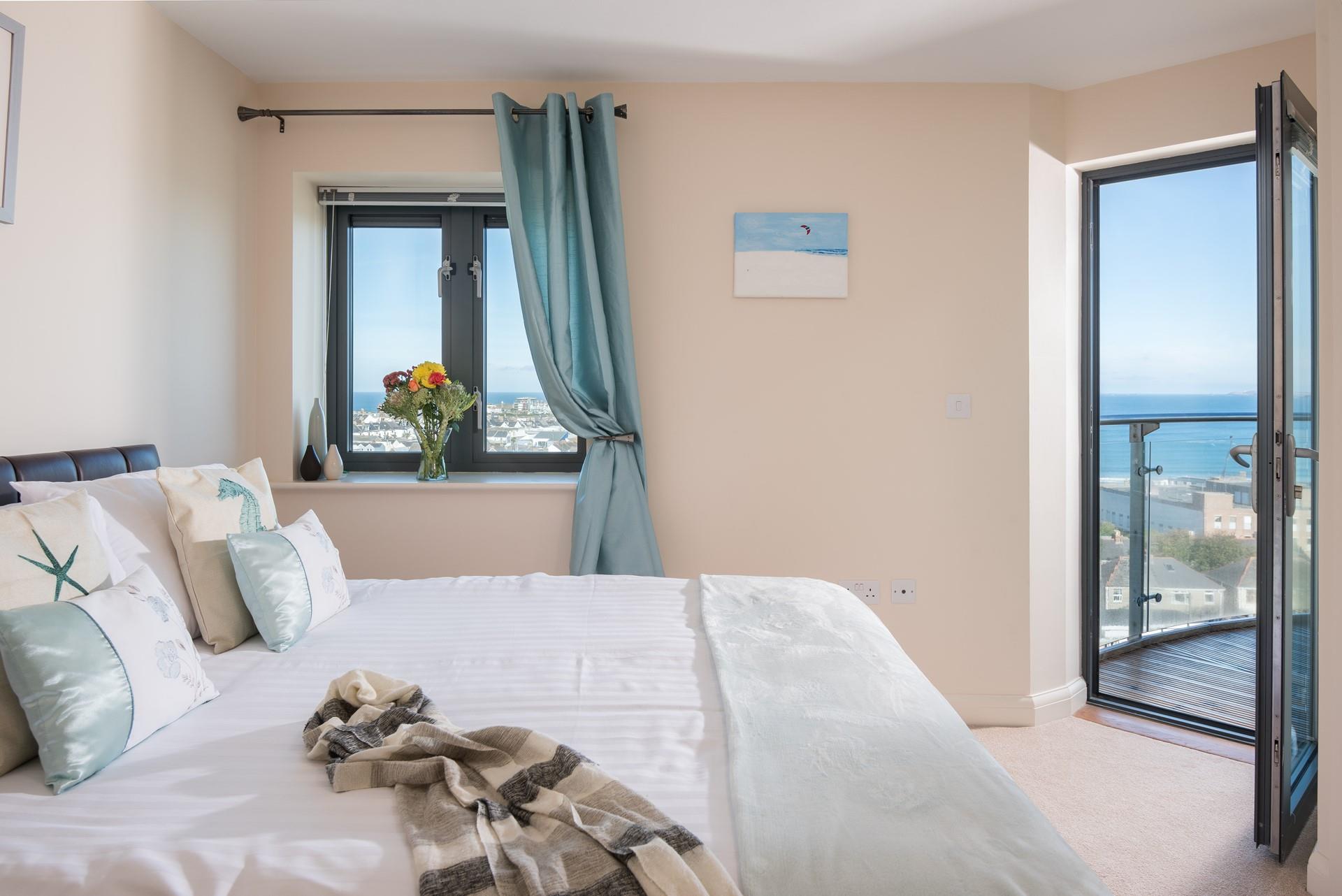 Simply slide off the bed and step onto the balcony to enjoy the breathtaking sea views each morning. 