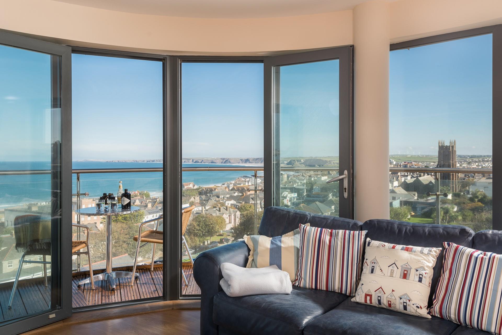 The sitting room is a beautiful space to relax in after a day exploring the coast.