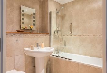 Pamper yourself before heading into town for the evening in the spacious family bathroom. 