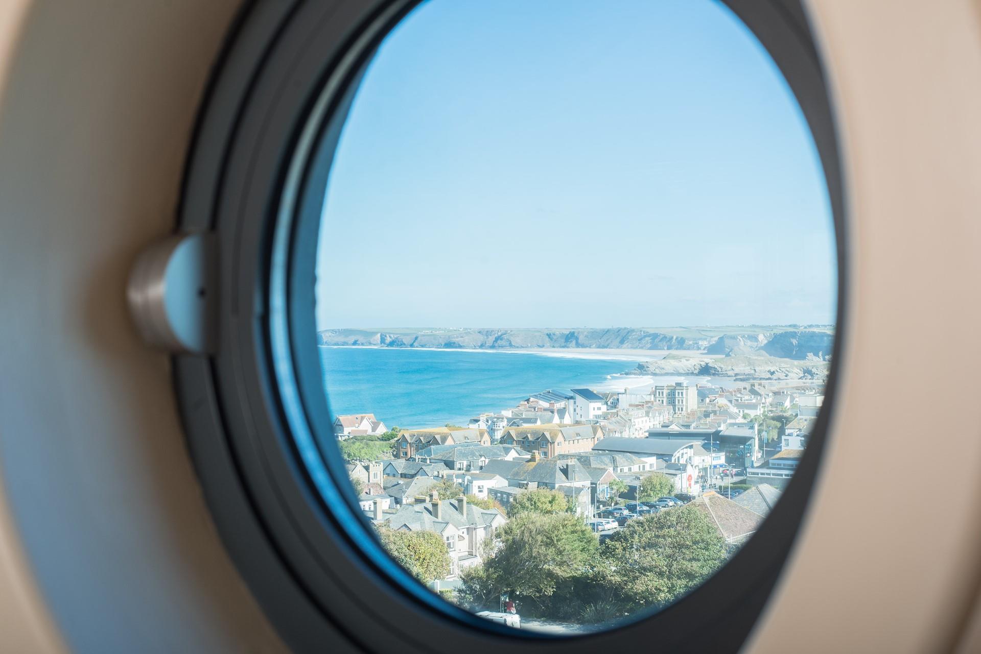 Get a glimpse of the sea from this cabin-style window. 