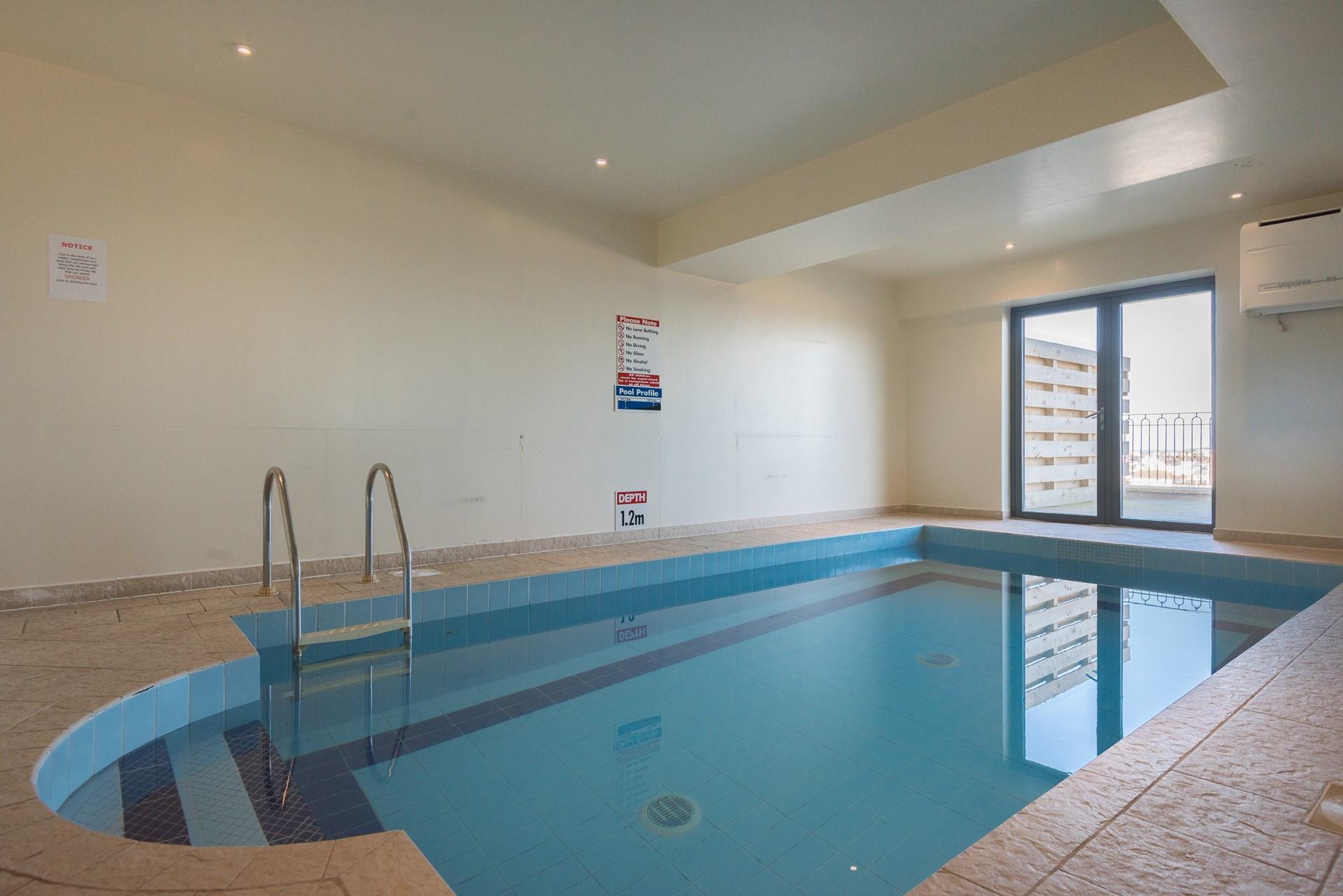 This modern apartment also benefits from access to a communal swimming pool. Perfect for getting some laps in before breakfast.