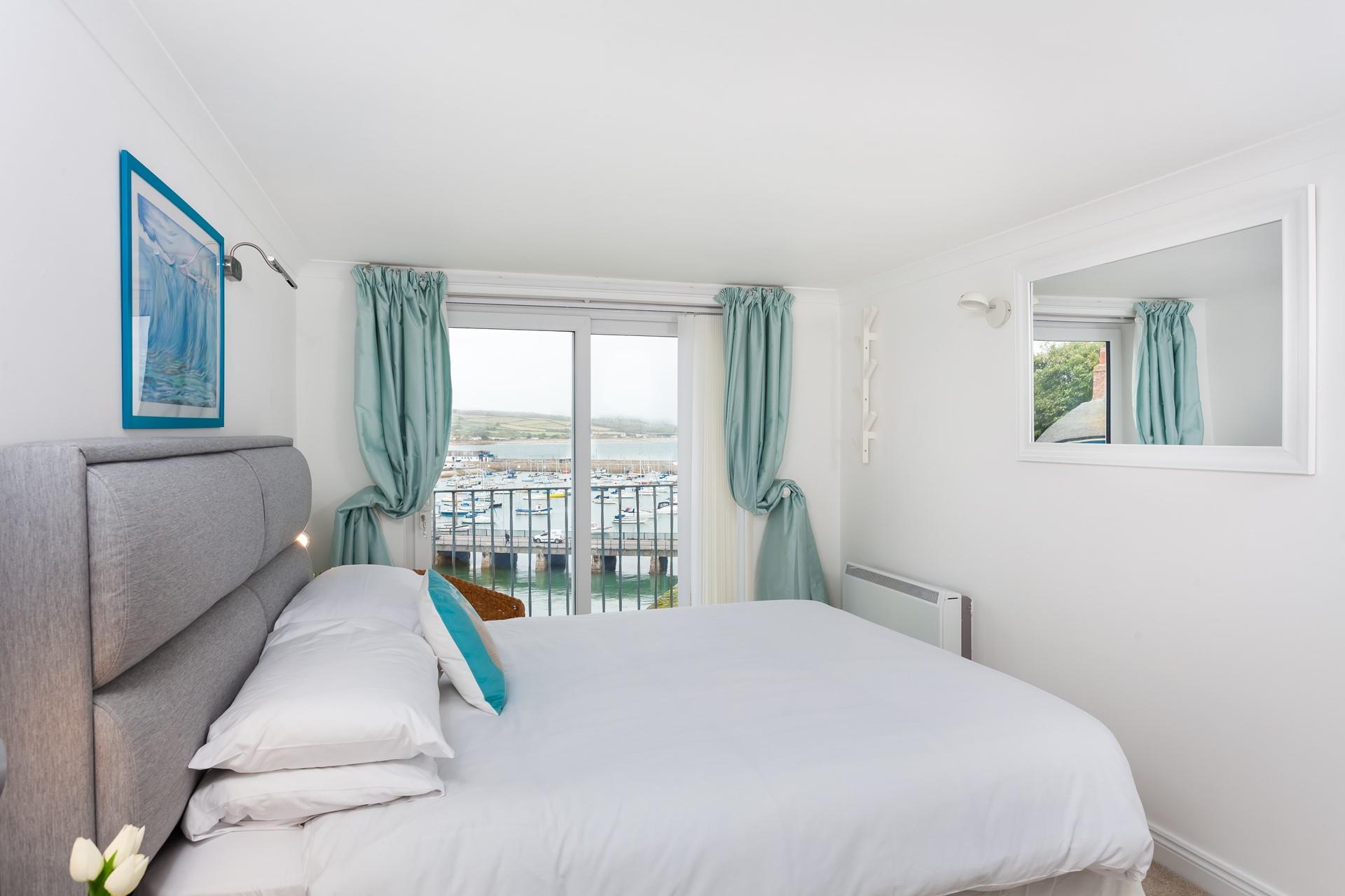 Wake up and open the curtains to the Juliette balcony and check on the weather to decide on the day's plans.