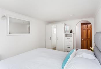 Bedroom 1 is bright and airy and offers a relaxing base to rest each night.