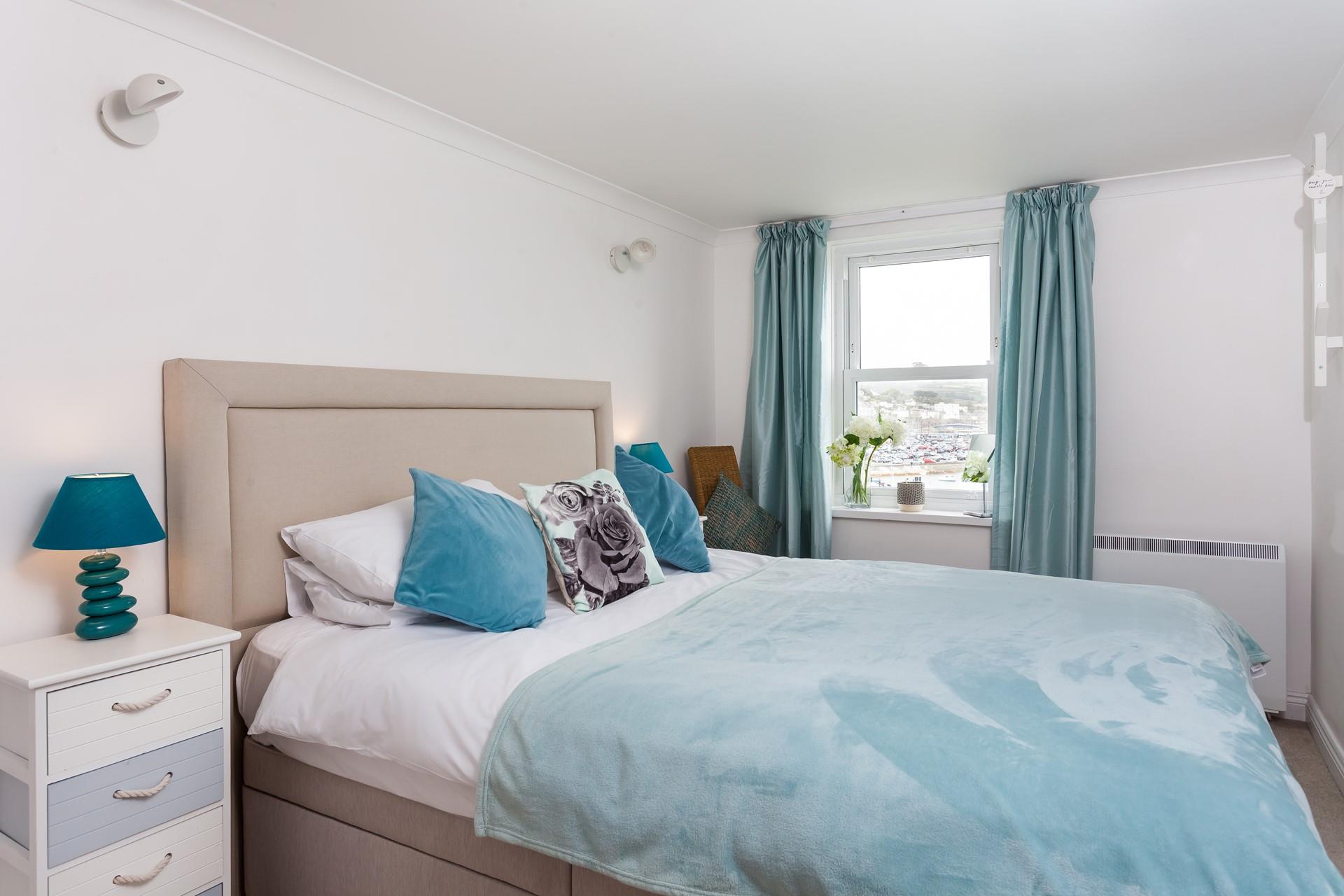 Bedroom 2 has sea views to wake up to each morning in the king size bed.