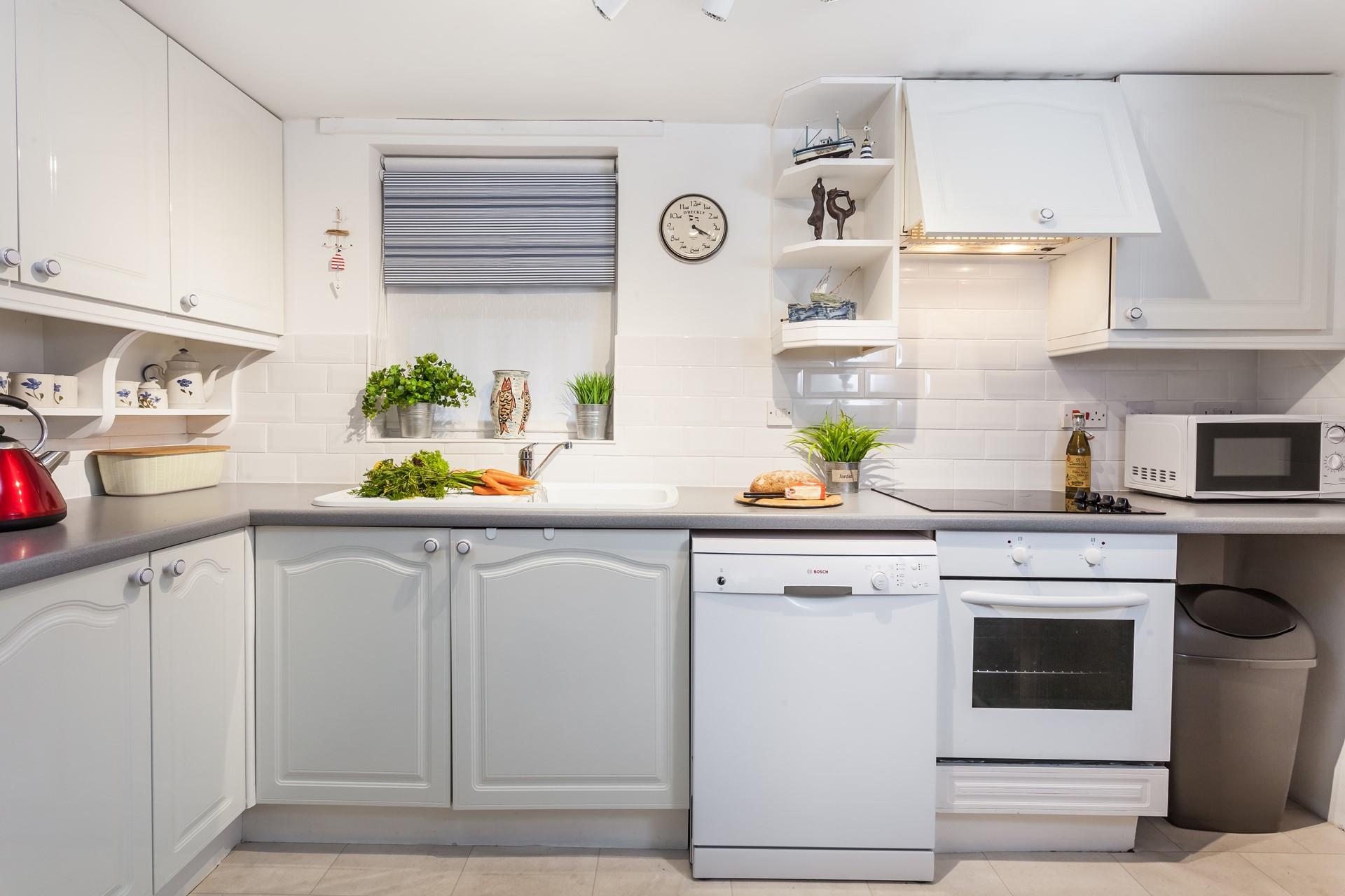The kitchen is well-equipped for the chef of the family to cook up a storm.