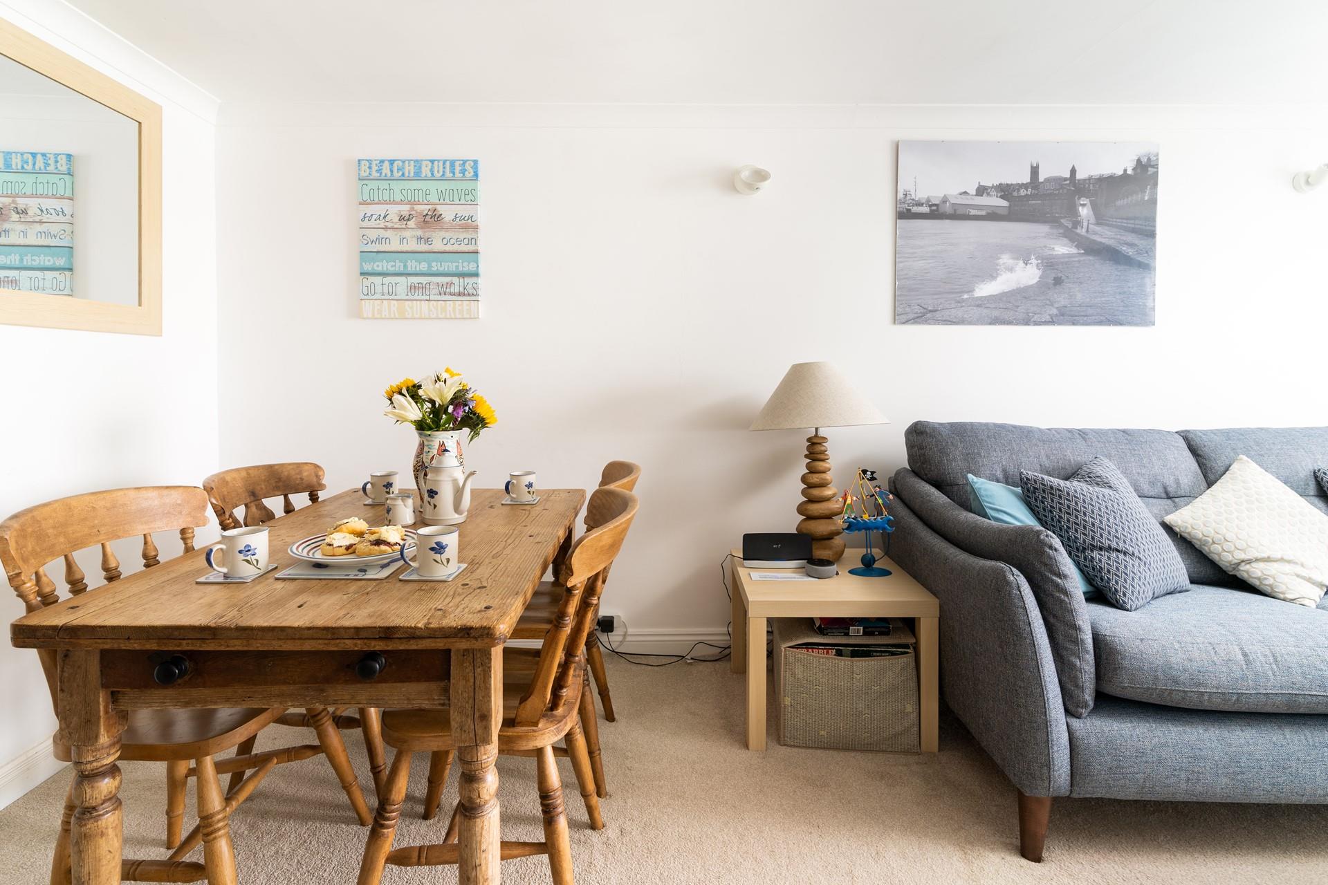 Sit around the table and indulge in a Cornish cream tea after a morning stroll.