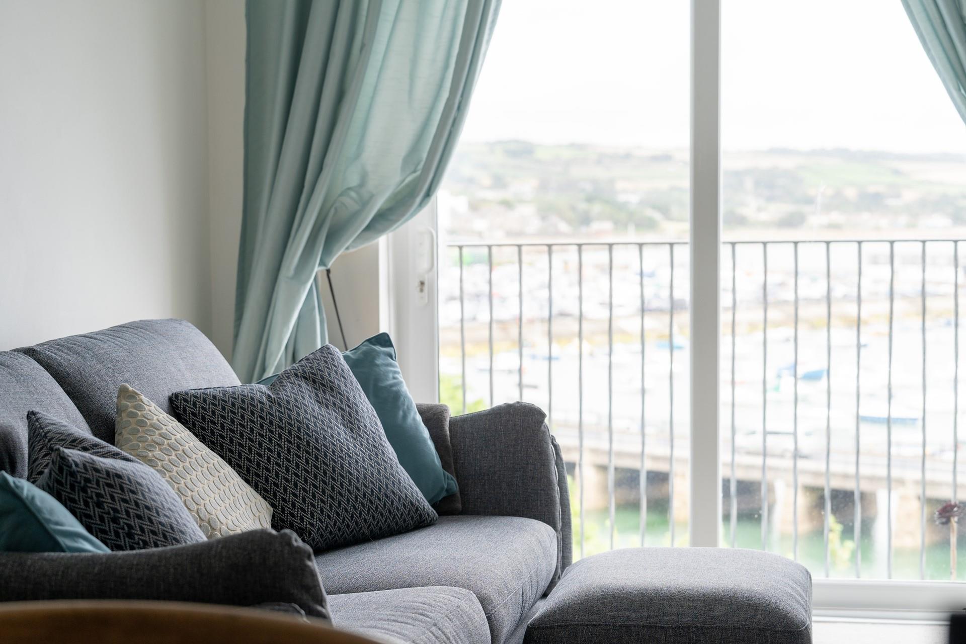 Pass the time watching the boats come and go in the harbour.