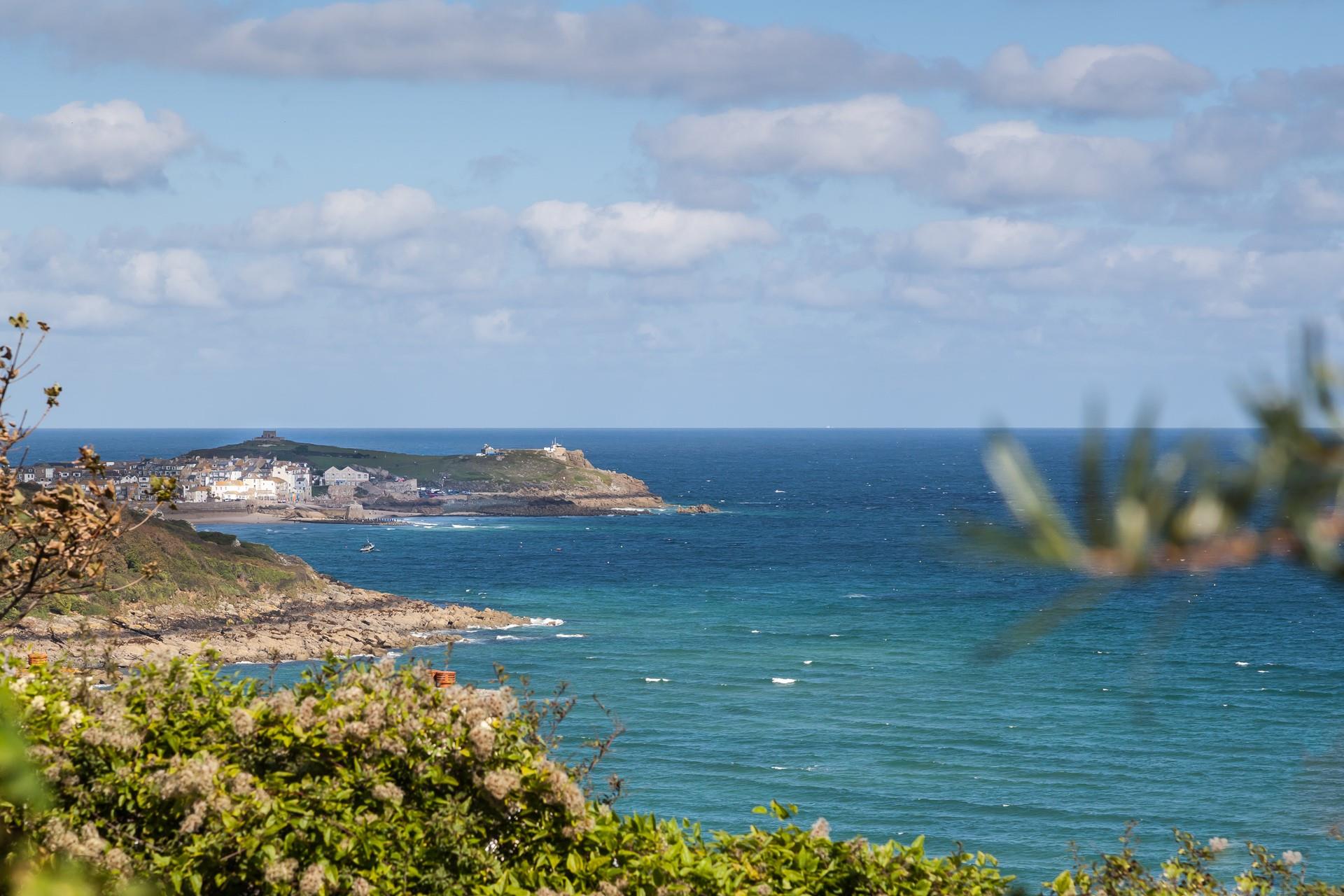 Wake up to incredible sea views each day and enjoy a drink on the patio as the sun goes down. 