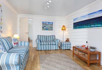 Sink into one of the comfy sofas and watch some TV, or simply enjoy the wonderful sea views. 