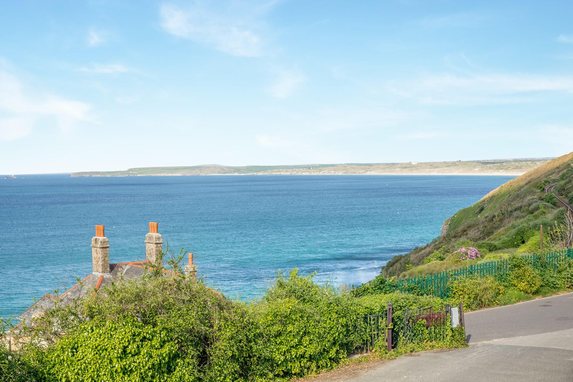 With far-reaching views across the bay, you might even see a pod of dolphins in the turquoise waters. 