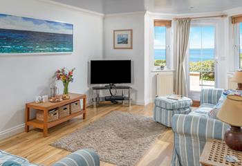 The coastal interiors mirror the stunning seaside location. 