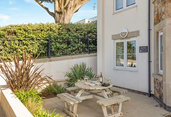 Enjoy wine and nibbles on the patio in the evening.