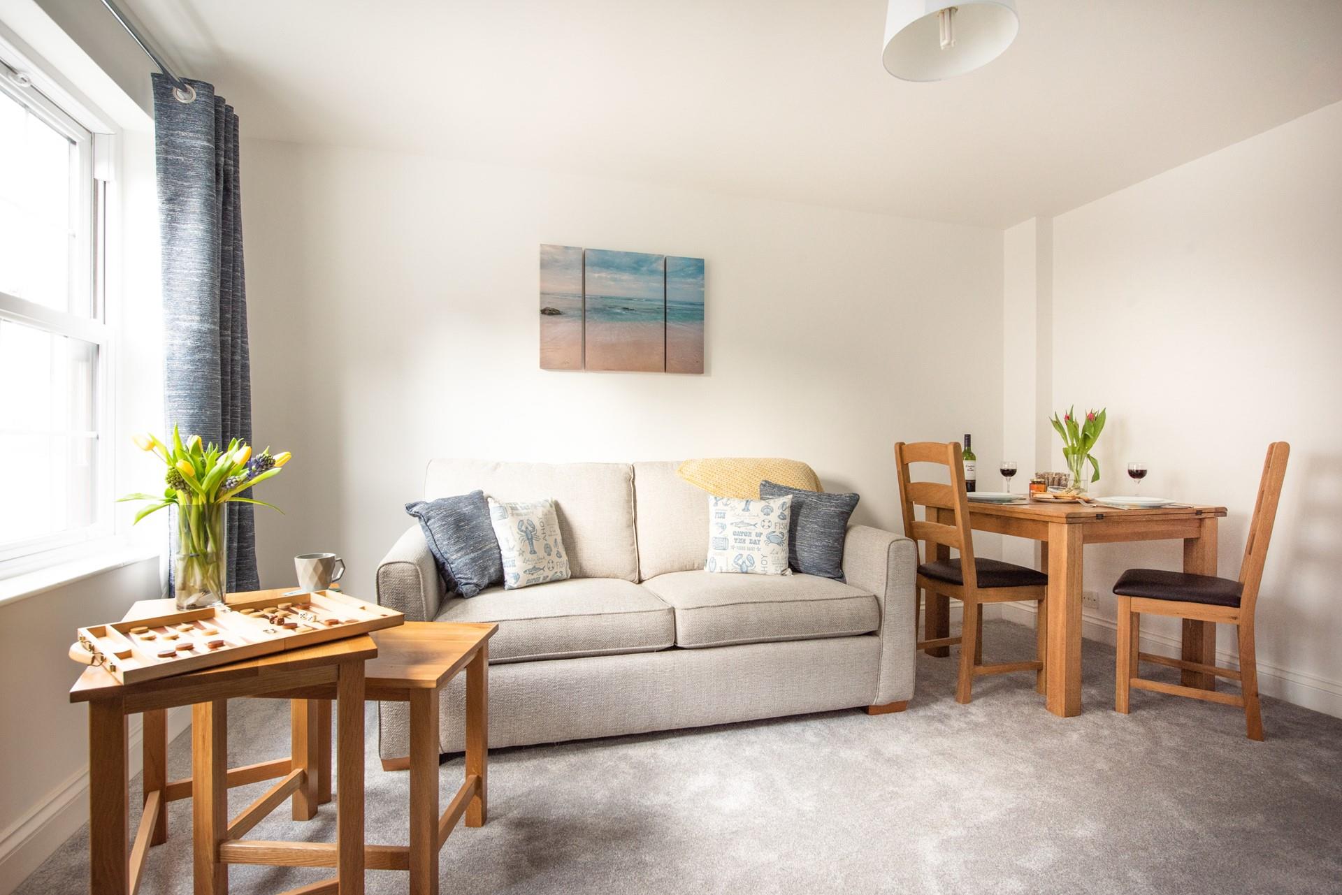 The minimalistic decor and quality furniture have created an uncluttered and calming place to pop a film on and relax.