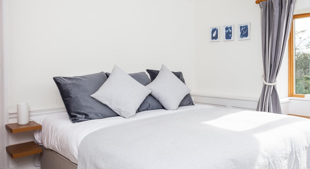 Drift off to sleep in the comfy king size bed.