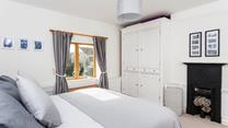 Bedroom 1 has a super king size zip and link bed, plus plenty of storage for your holiday outfits. 