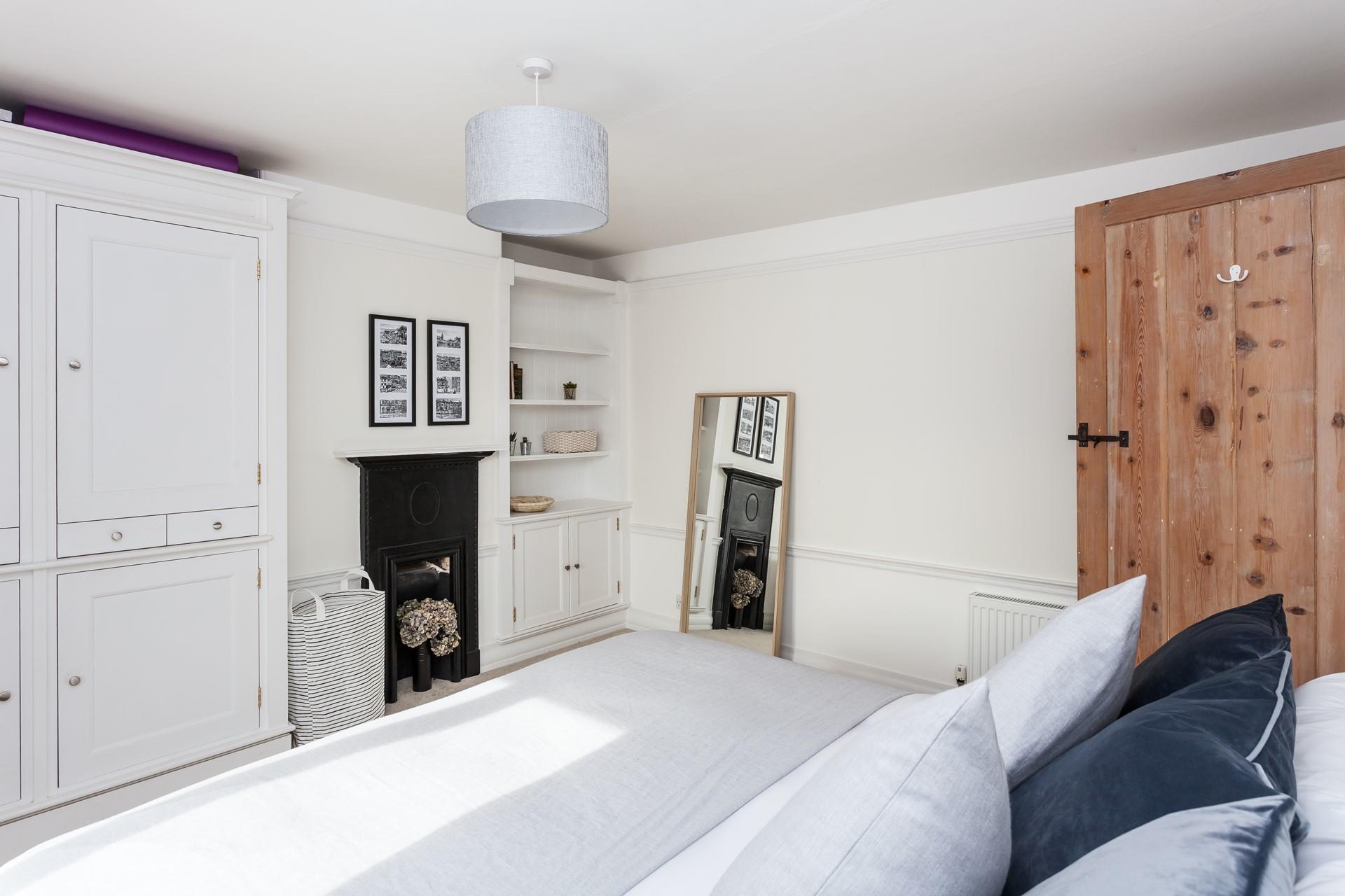 There's plenty of space to make yourself at home in this beautiful bedroom.