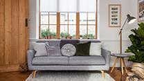 Recline on the comfy sofa in the sitting room, next to the woodburner. 