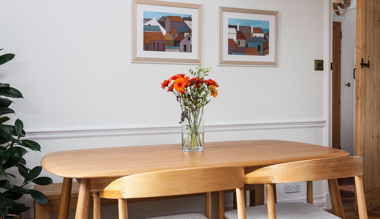 Enjoy a Cornish breakfast at the dining table, which overlooks the garden.