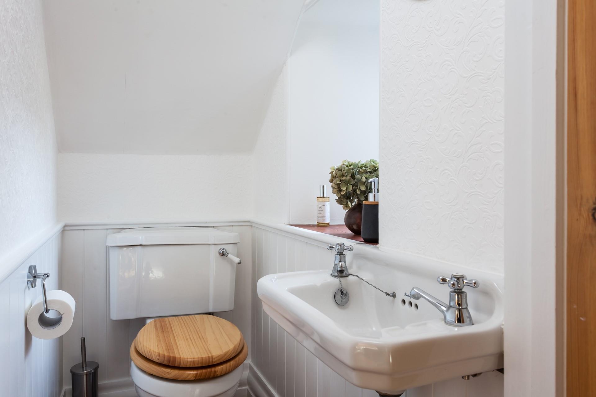 A handy downstairs cloakroom.