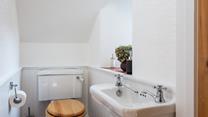A handy downstairs cloakroom.