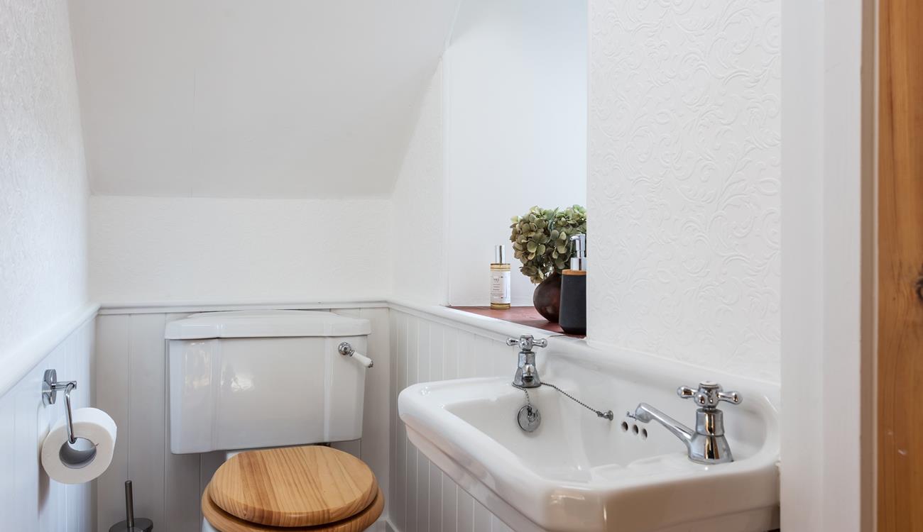 A handy downstairs cloakroom.