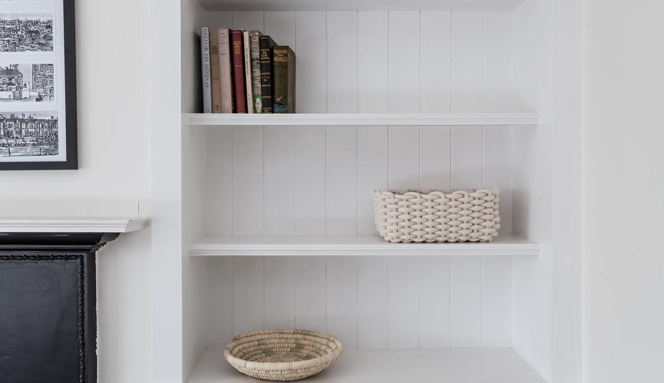 Make the most of the handy storage space in the spacious bedroom. 