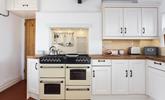 Cooking is hassle free in this spacious kitchen which has everything you need to create a culinary delight.  - Thumbnail Image