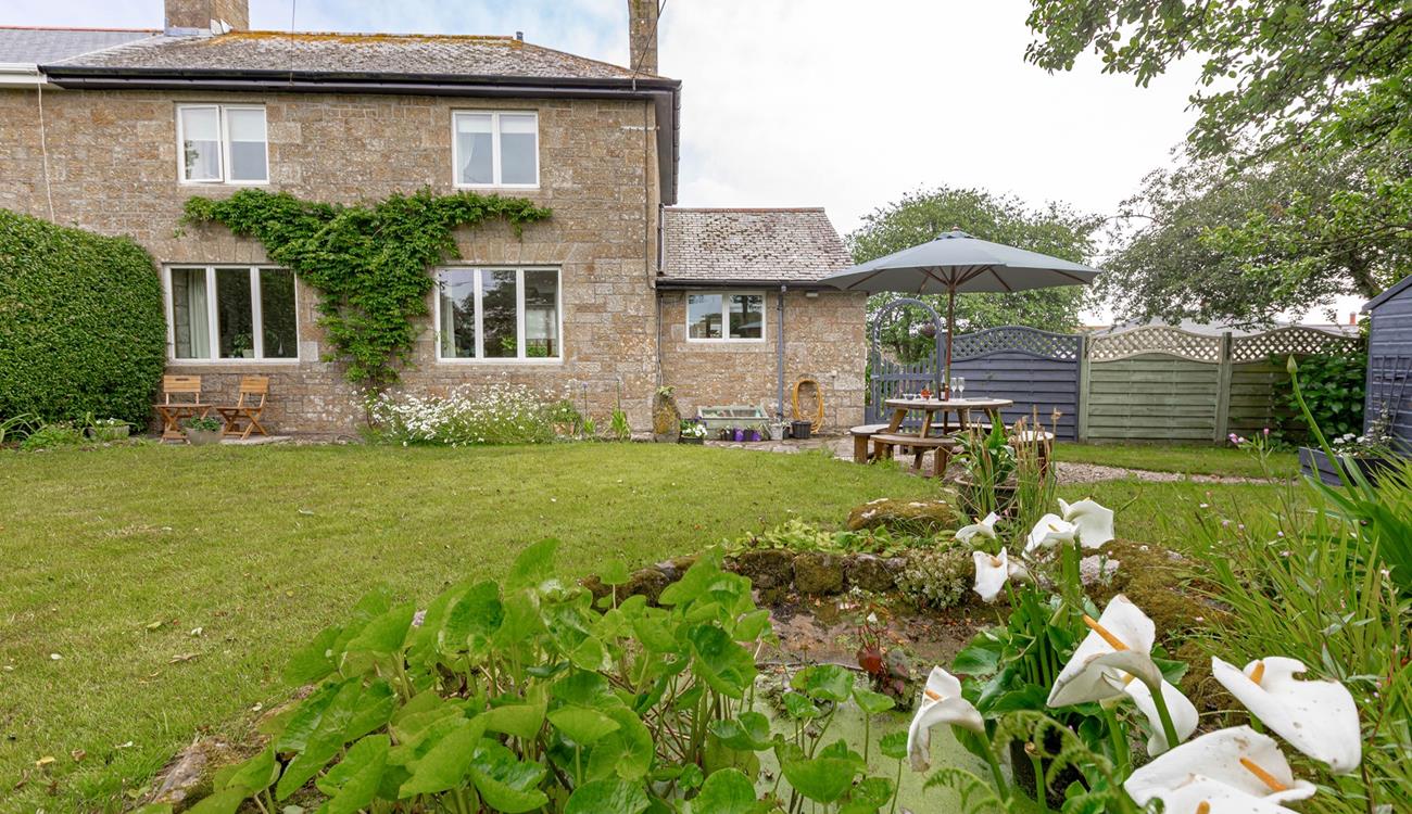 Watch the children play in the garden whilst relaxing in the sun.