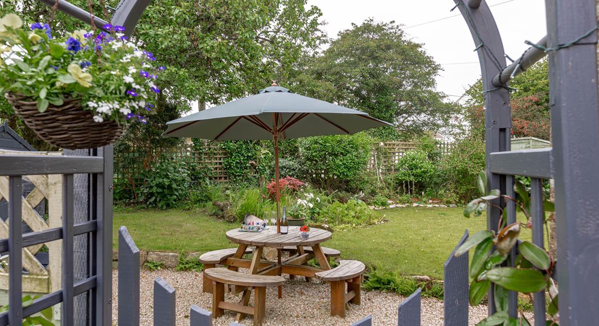 Start your day with a hot cup of tea under the apple trees.