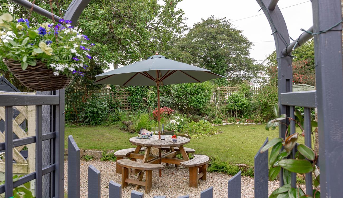 Start your day with a hot cup of tea under the apple trees.