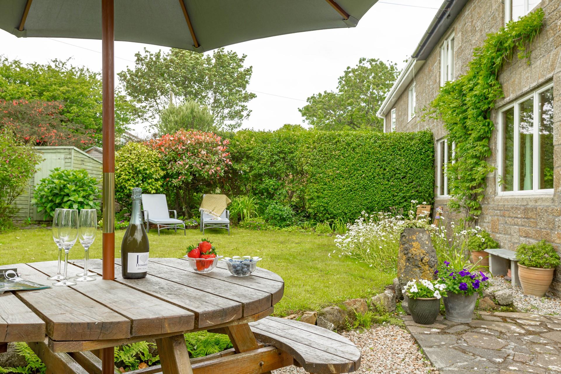 Pop open a bottle of prosecco and soak up the sun in the garden.