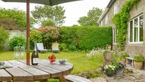 Pop open a bottle of prosecco and soak up the sun in the garden.
