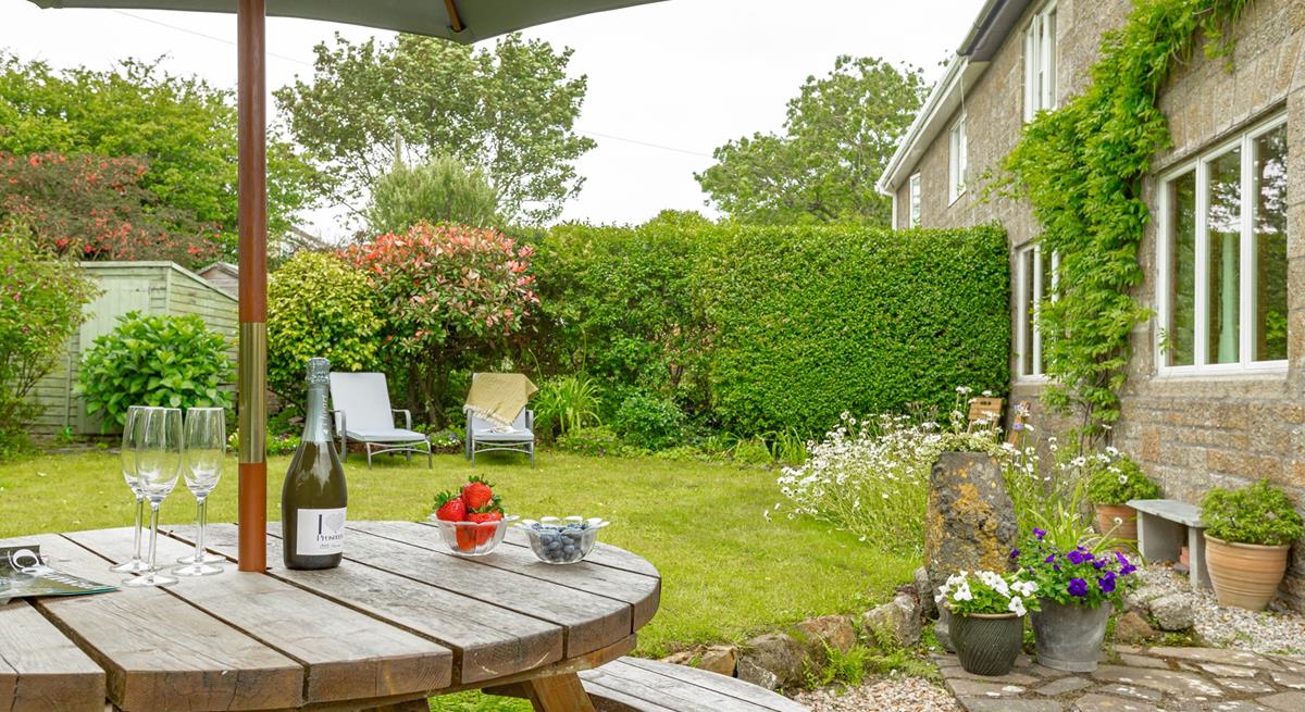 Pop open a bottle of prosecco and soak up the sun in the garden.