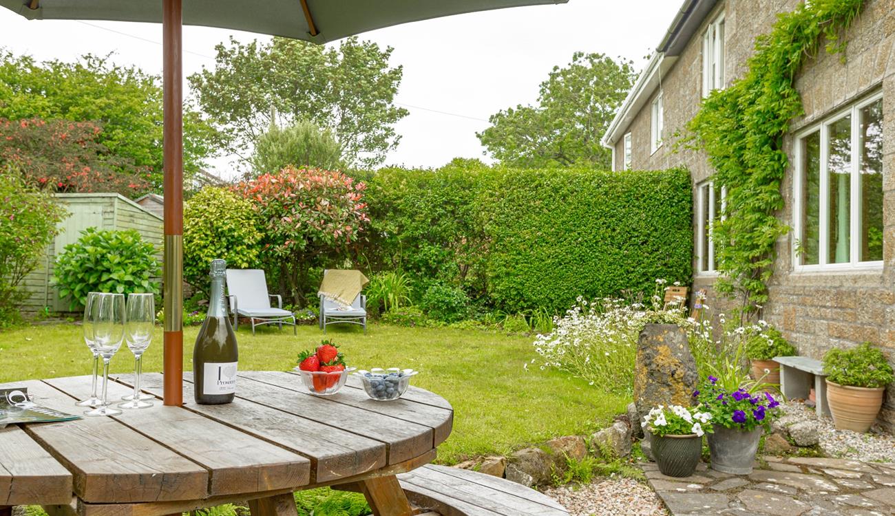 Pop open a bottle of prosecco and soak up the sun in the garden.