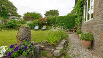 Your furry friend will love playing in the large garden.