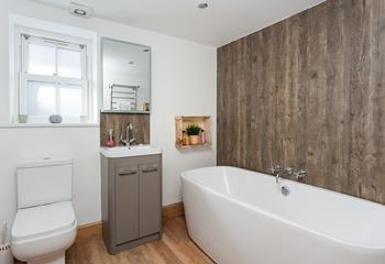 This gorgeous freestanding double ended bath is the perfect place to relax after a busy day.