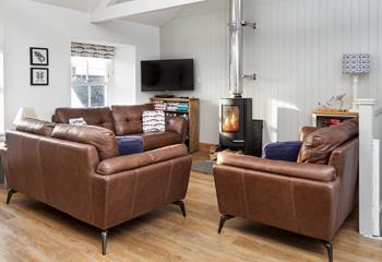 Sink into a comfy sofa for a cosy place to relax with a cuppa and a good book, or a glass of wine and a movie in front of the woodburner.