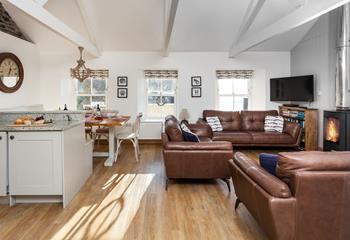 Enjoy quality time together in the nautical themed open plan kitchen, dining and lounge.