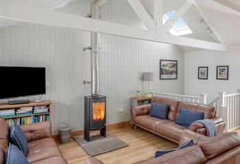 Sink into a comfy sofa with a cuppa and a good book in front of the woodburner.
