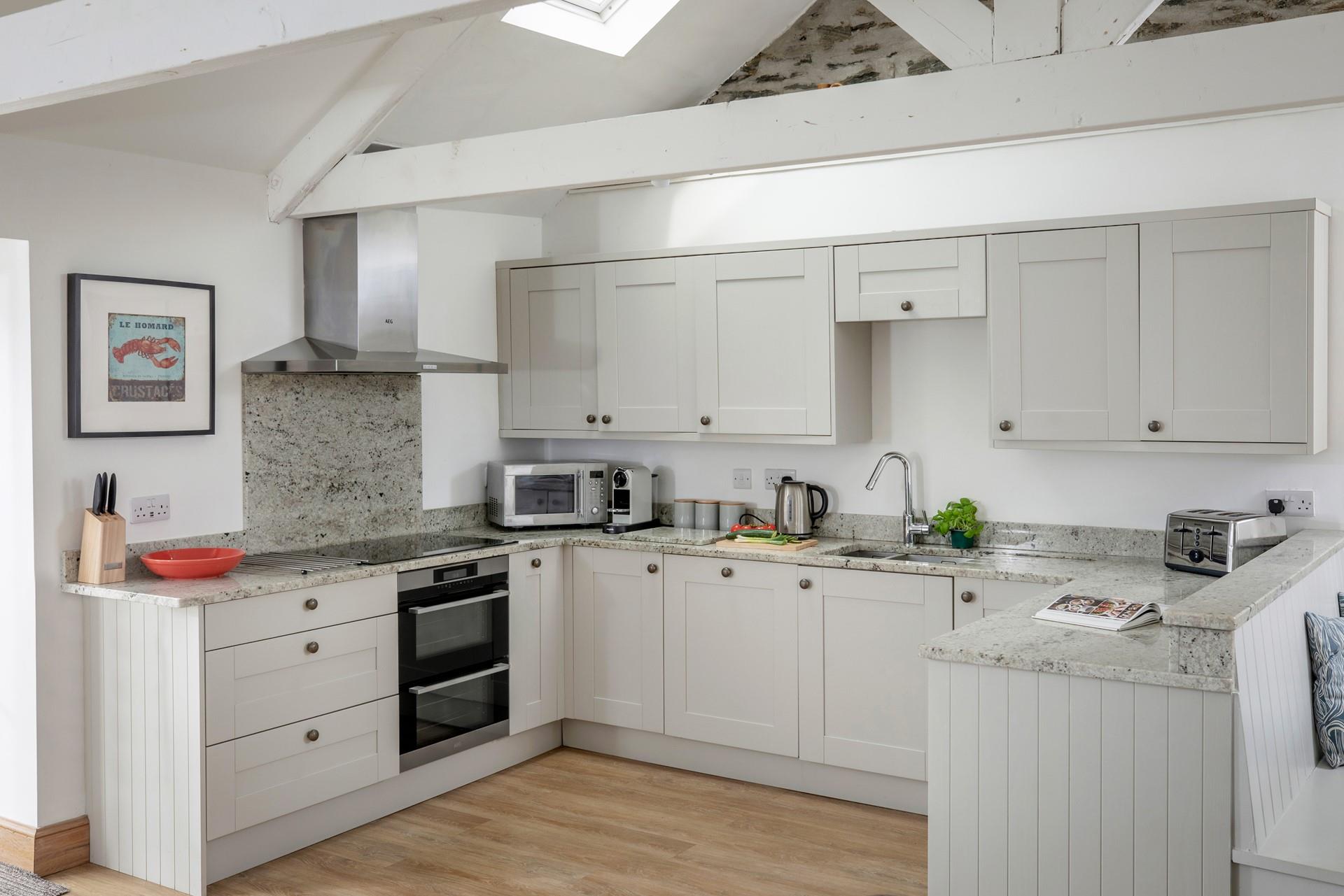 Rustle up a delicious dinner with fresh local produce in the beautiful well-equipped kitchen. 