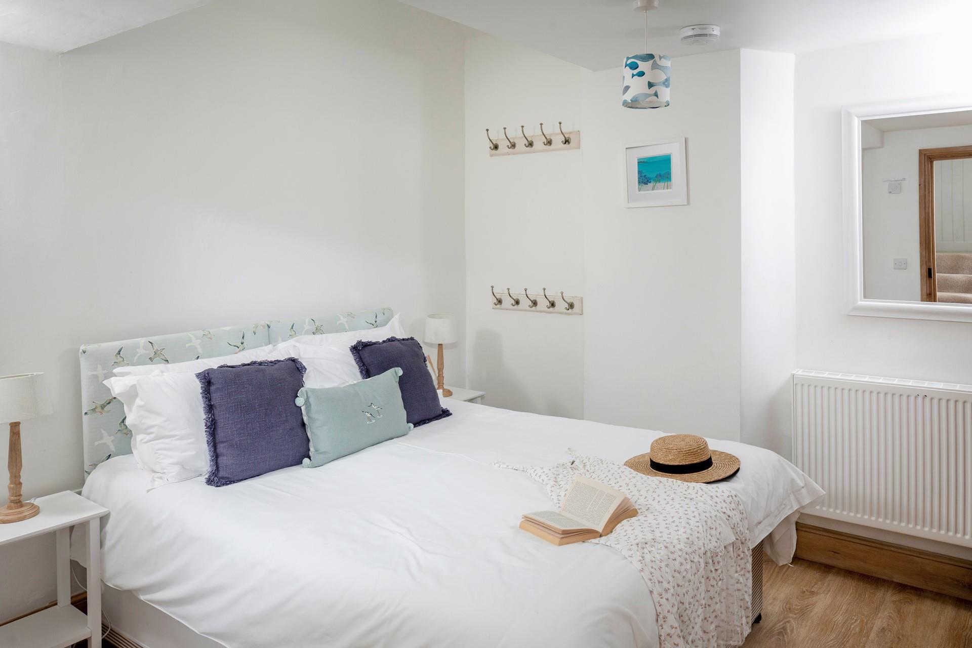 This cosy bedroom can be transformed into a twin with these handy zip and link beds.