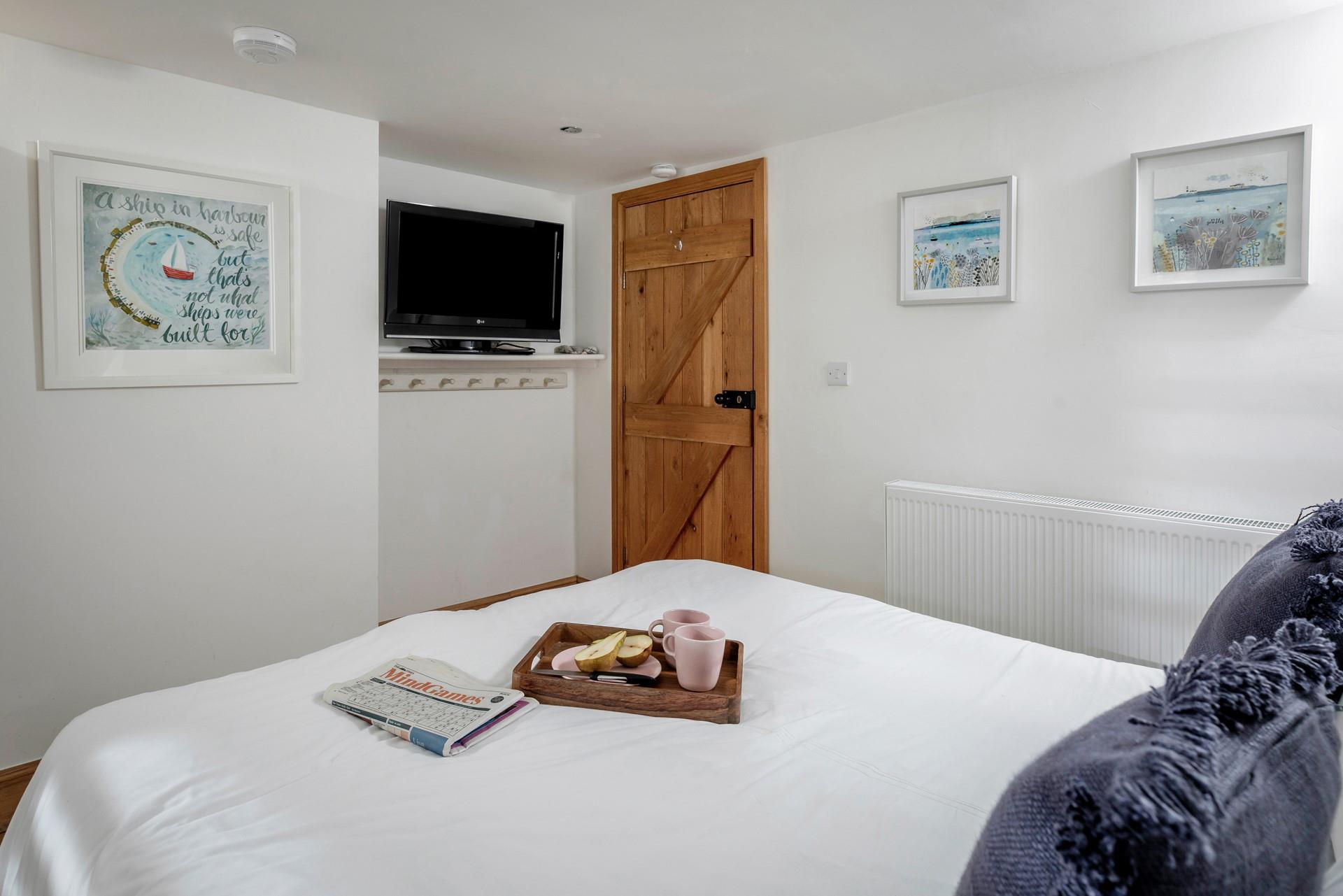 Pretty coastal artwork reflects the seaside location of Rock House.